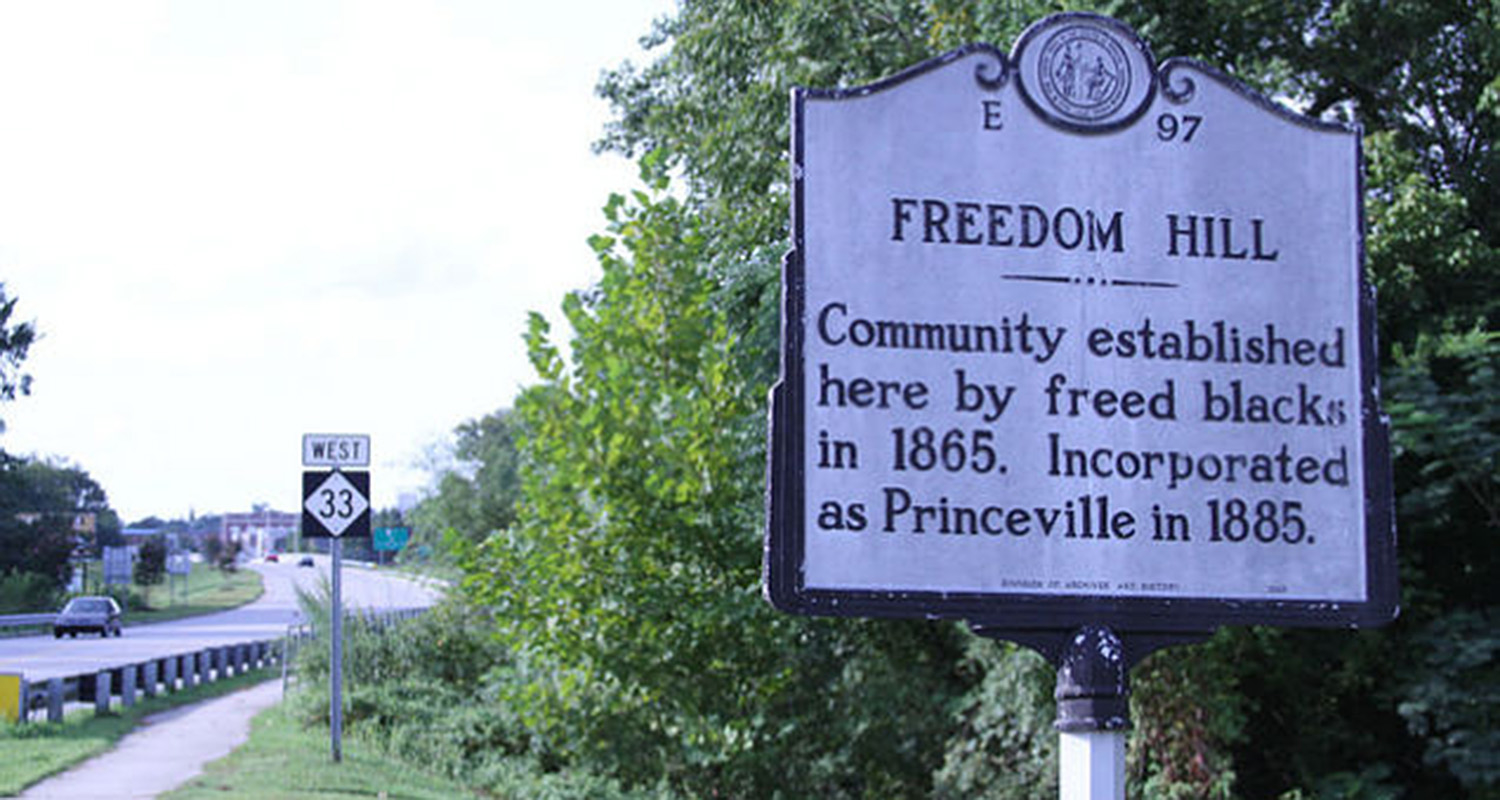 Historic marker noting the founding of Princeville as Liberty Hill in 1865.