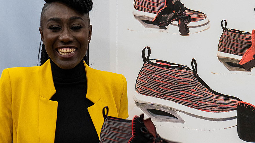 Pensole Woman holding sneaker design