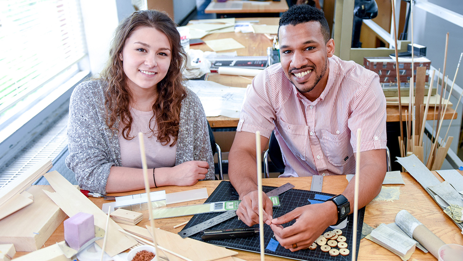 Architecture students seated at desk