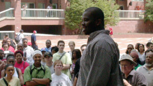 Najja Baptist speaking to a protest crowd on NC State’s brickyard in 2002; Photo taken by Demarcus Williams.