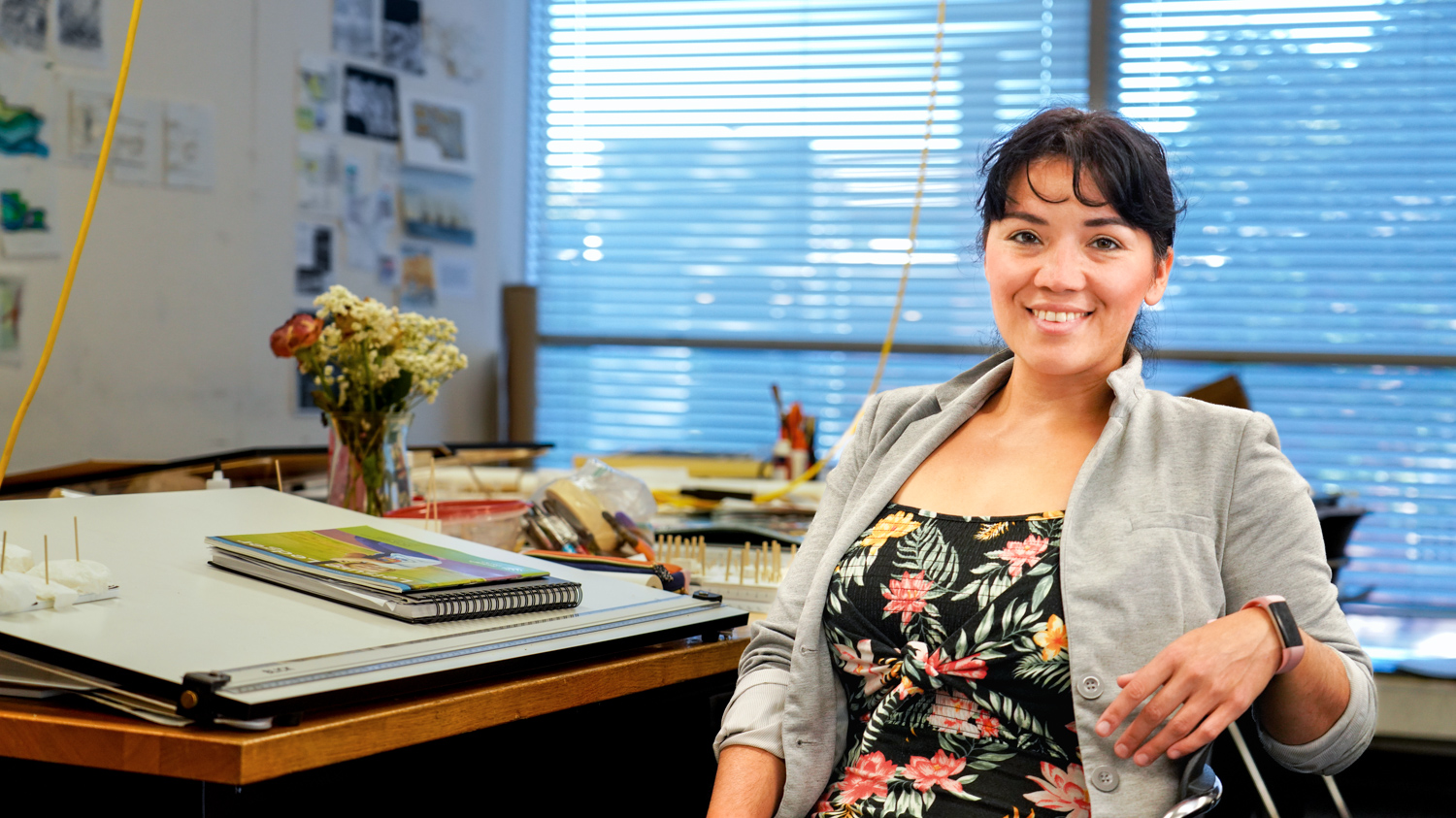 Melissa Manjarrez Dominguez at her desk in the Landscape Architecture studio.