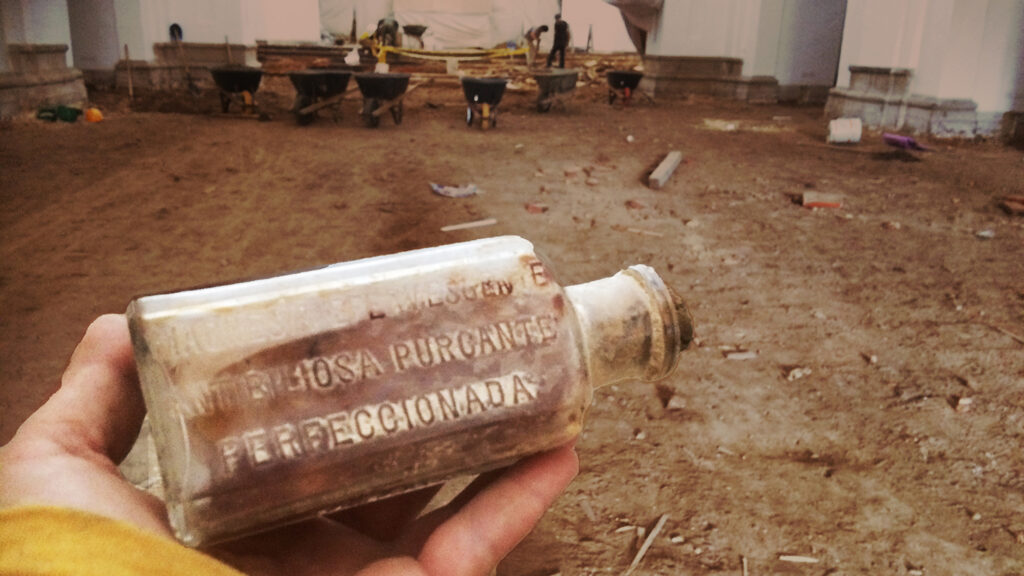 A magnesium bottle from a pharmacy in Havana, Cuba containing a note that was buried with someone in the church. The message was unreadable since the ink on the animal skin had deteriorated.