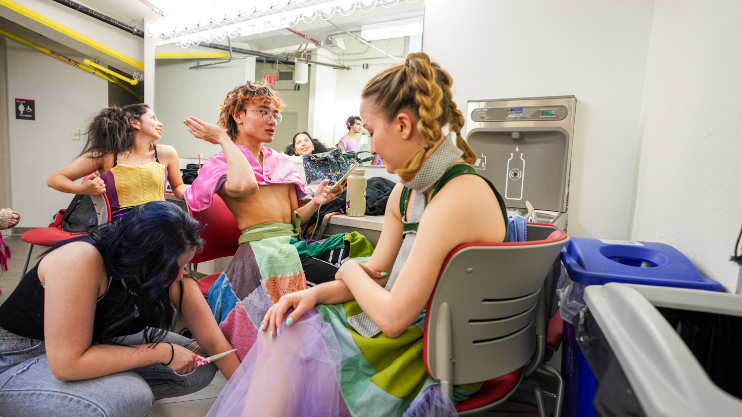 Backstage during the 2023 Art2Wear show during hair and makeup preparation.