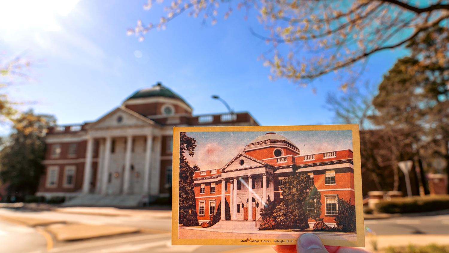 Brooks Hall at NC State's College of Design, with an old postcard depicting the building during the 1920s.