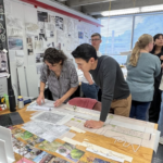 Student Katie Pollock explains her design to i-Team member Erick Pena. Photo courtesy of the City of Durham