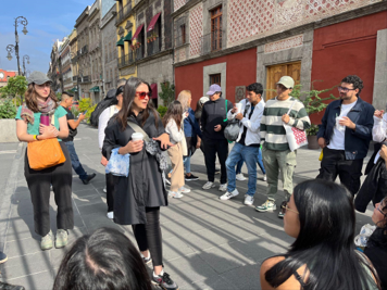 Renowned architect Gabriela Carrillo (center) leads students around the city.