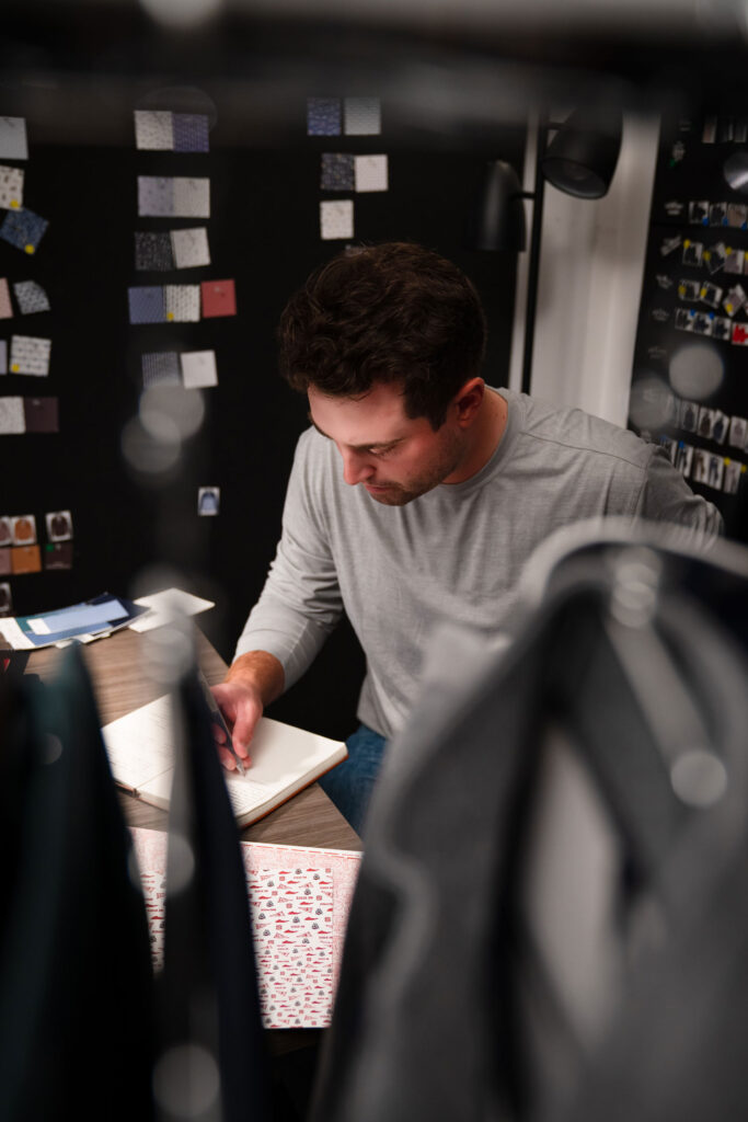 Ben drawing at desk