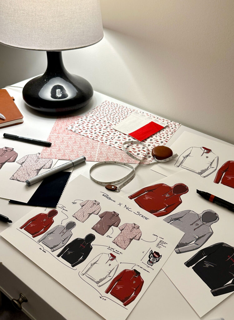 desk with sketches and fabric swatches
