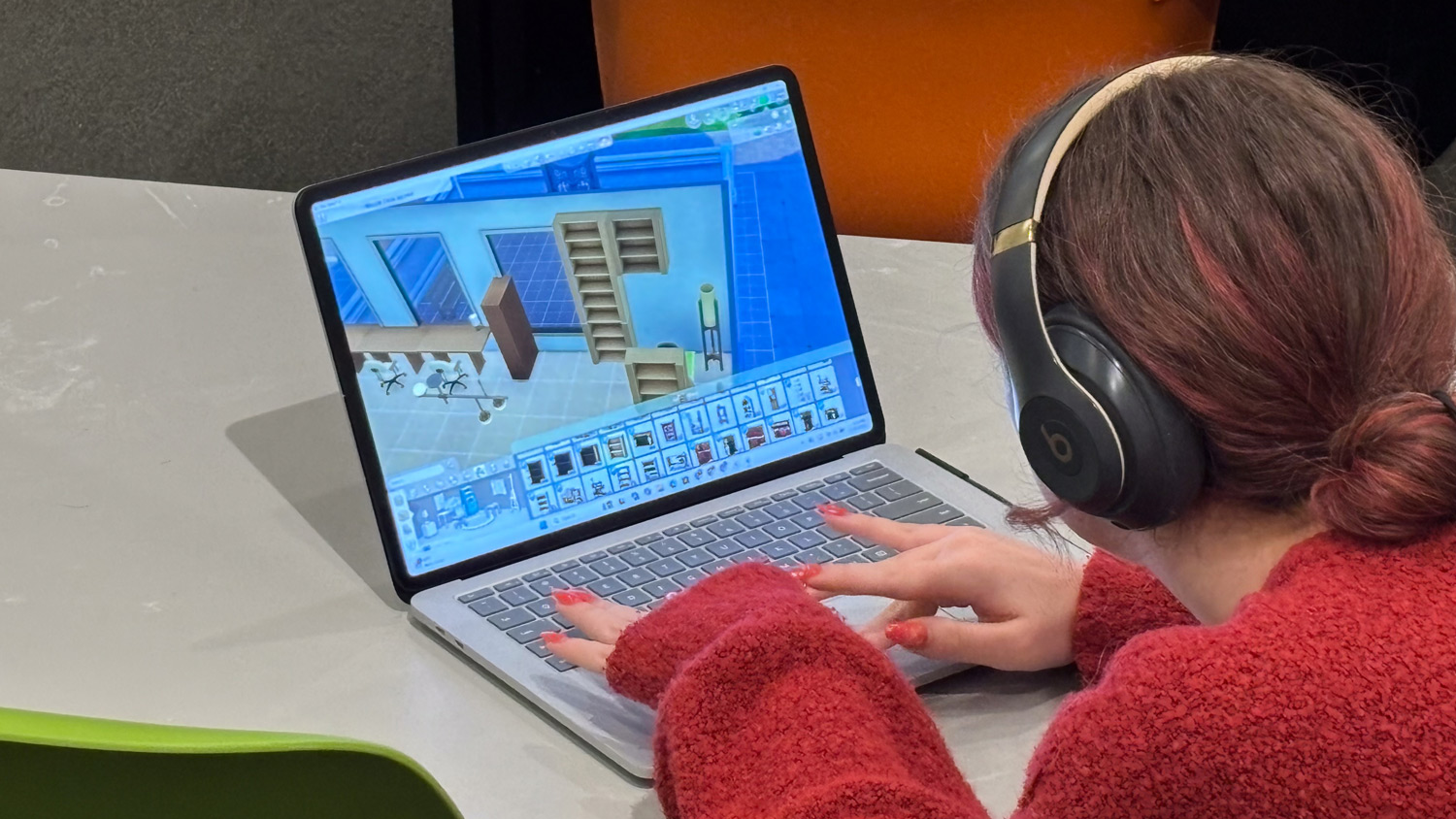 McKinnon Stewart, a Design Studies senior, works on a model of the Design Library as part of Téllez’s Design Studies class.