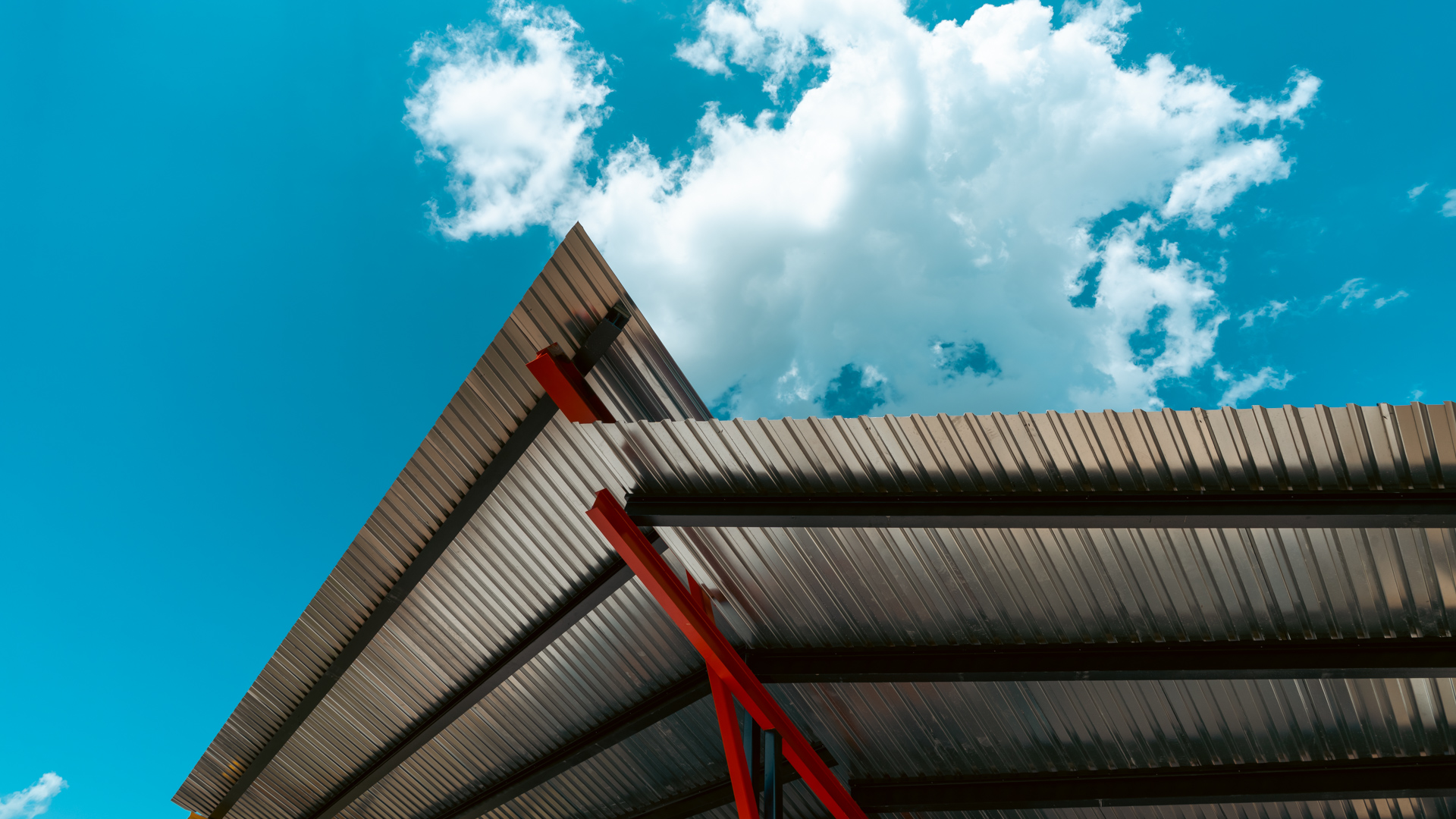 Metal roof against blue sky