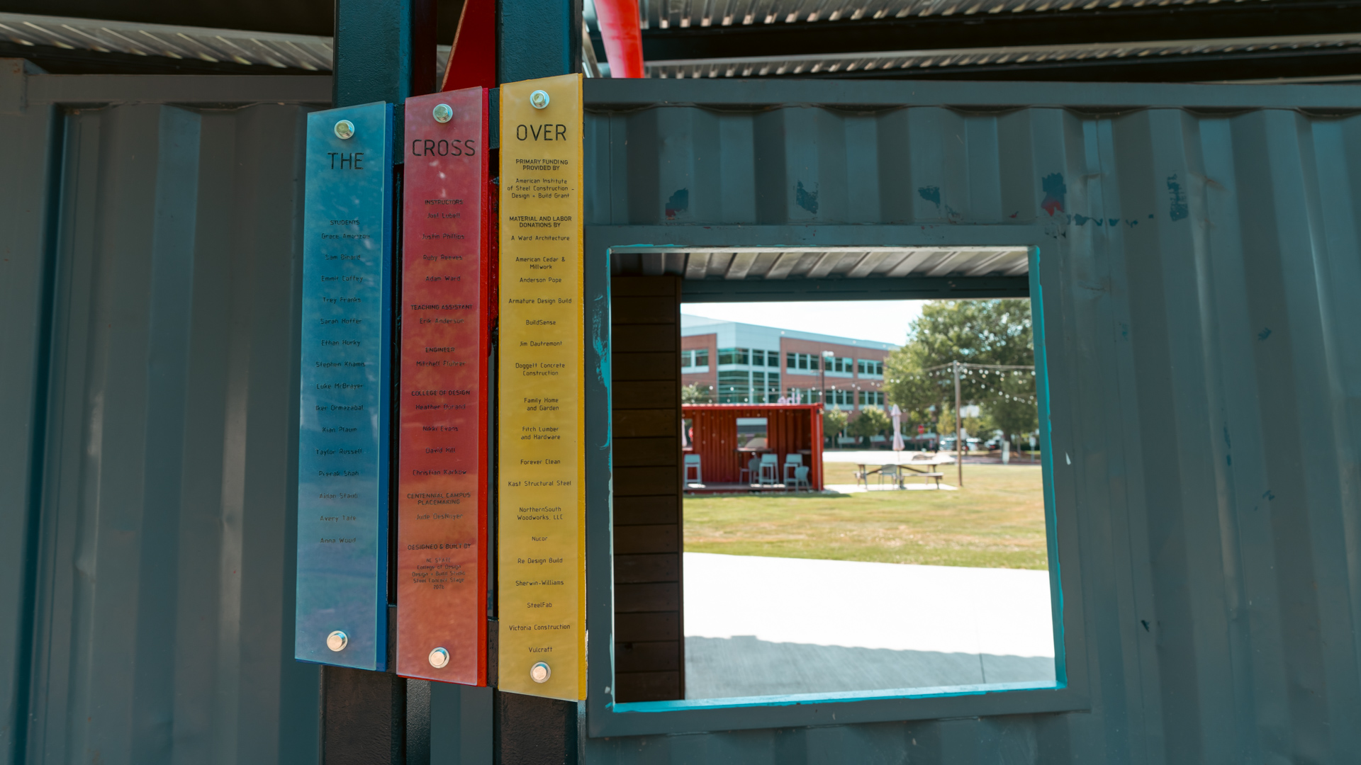 Colorful plaques hanging near window